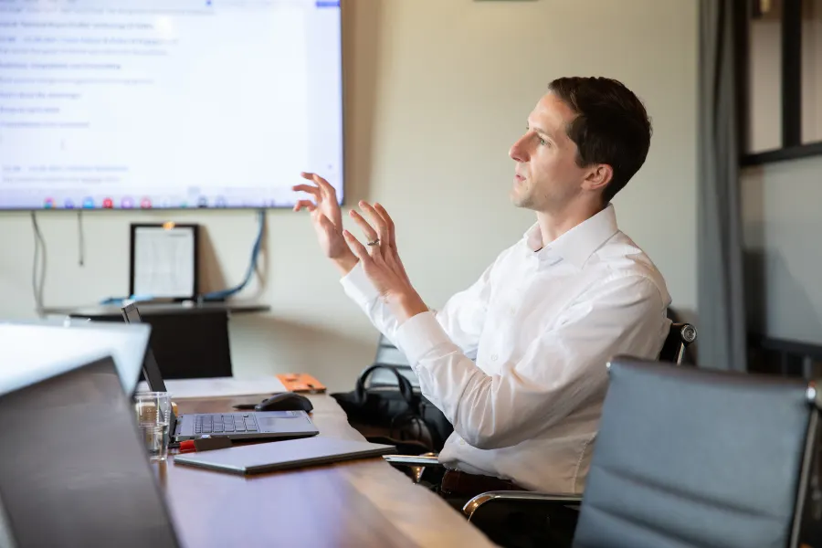 Jared Epp, Advisory Partner, talking through a plan with the Acquen team